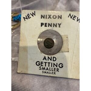 Nixon Getting Smaller and smaller mini penny 1964